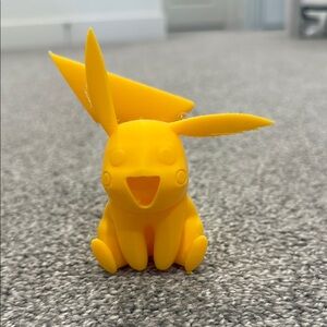 Yellow 3D printed Pikachu Figurine